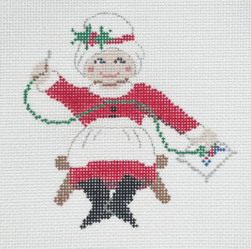 Needlepointing Mrs. Claus