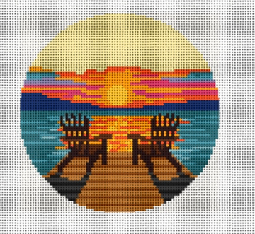 Adirondack Chairs on Lake at Sunset