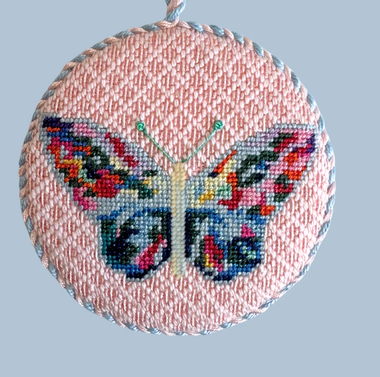 Colorful Butterfly on Pink Round